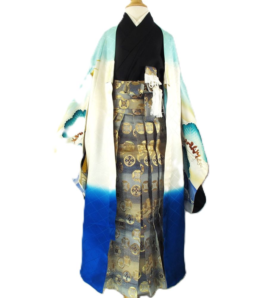 Ivory and blue boy's haori with pine trees and gold crest hakama