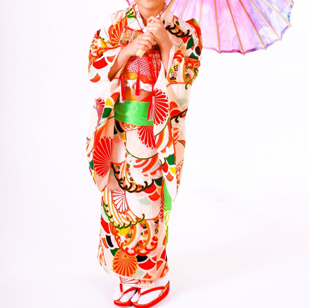 Cream children's kimono with red chrysanthemums and waves