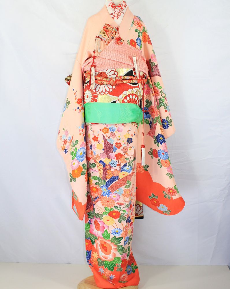 Peach children's kimono with peonies and chrysanthemums