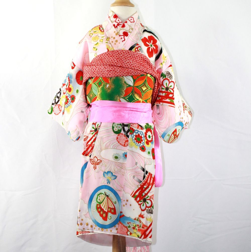 Pink children's kimono with butterfly roundels