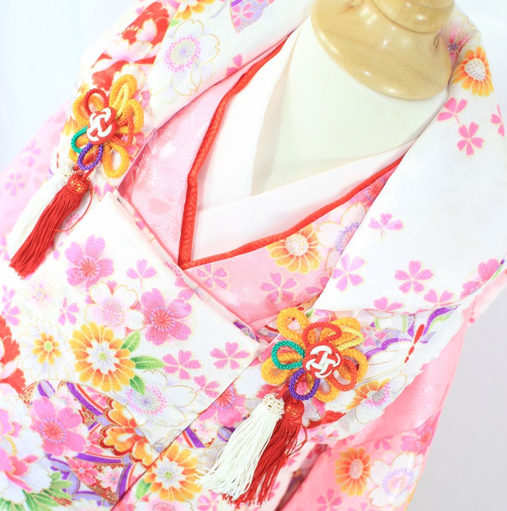Pink children's kimono with cherry blossoms and butterflies